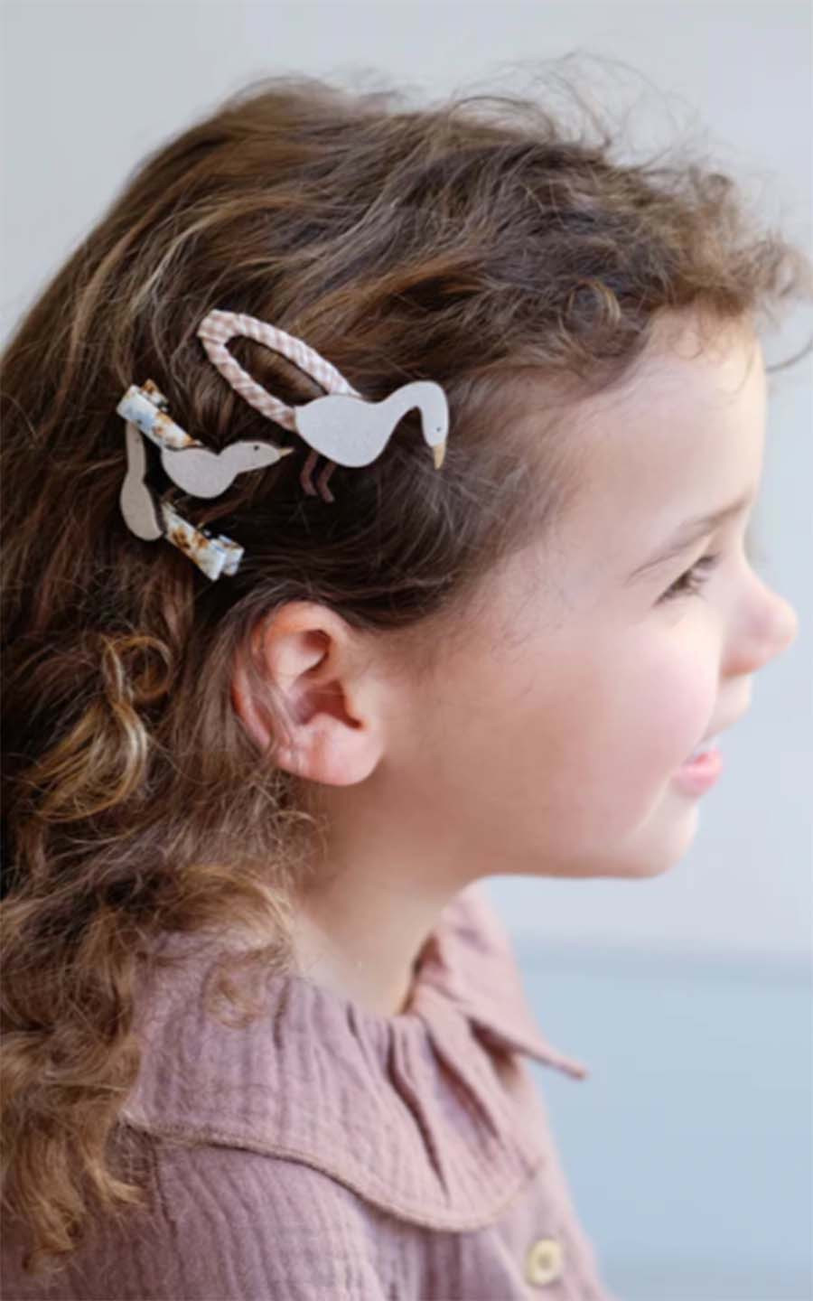 zoom in on Beige Haaraccessoire image Beige Haaraccessoire image