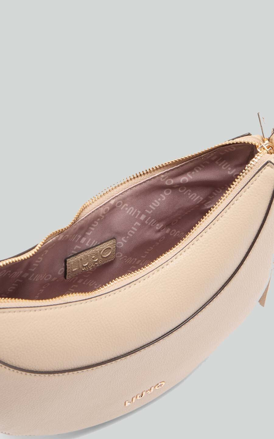 Lichtbeige Cross body image